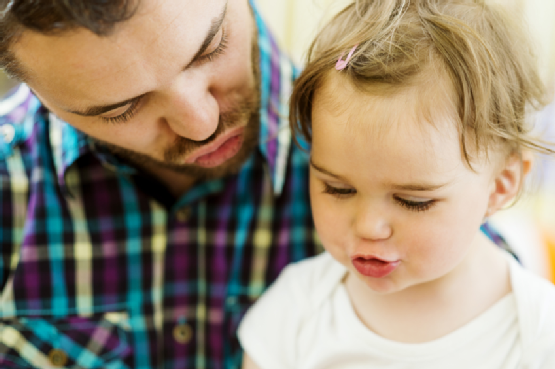 Father and daughter playing