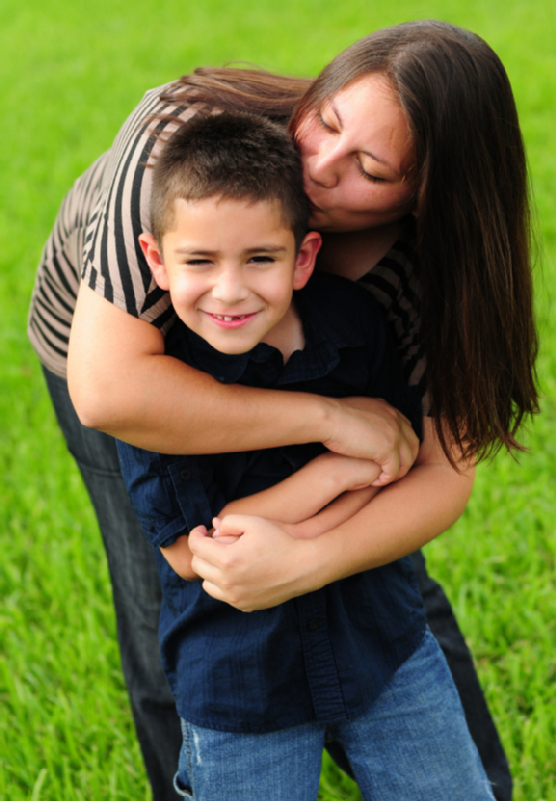 Mommy kissing son